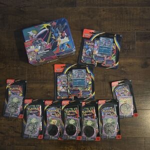 Sealed Pokemon Trading Card Game Set with Tin Phantasmal Flames